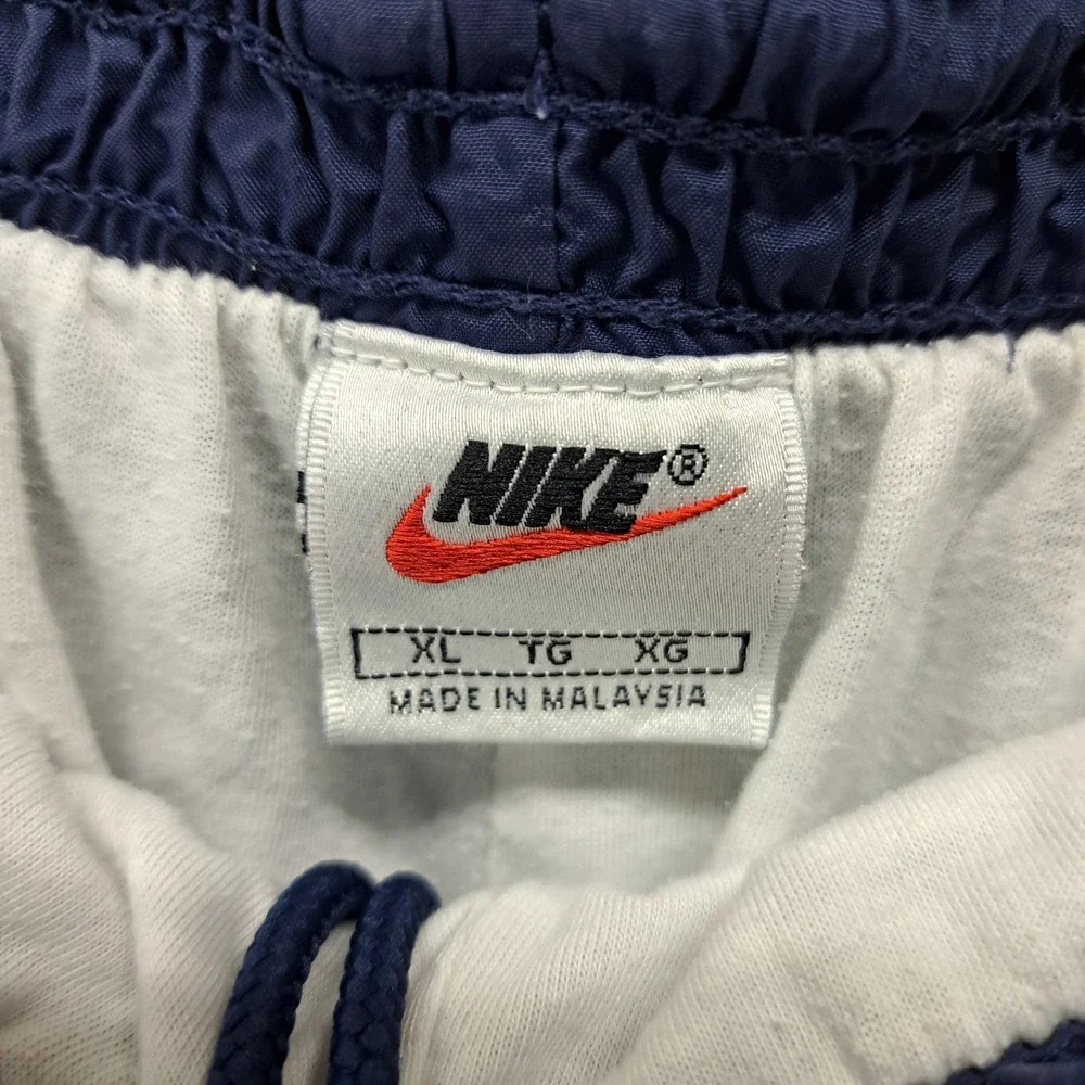 Vintage Nike Track Pants XL Blue Nylon Zippered Cuffed Bottoms 90s Menswear